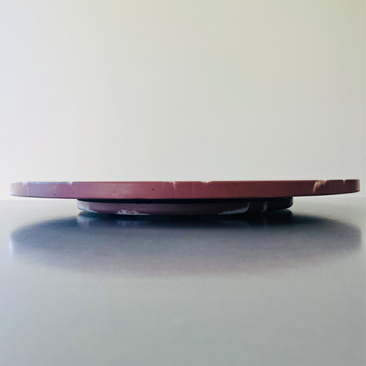 A round concrete Lazy Susan