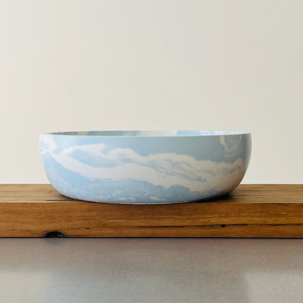 Cove Bowl in signature Salt Blue Marble Concrete finish